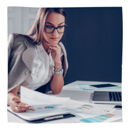 Realistic women looking at financial reports for tattoo studio sales