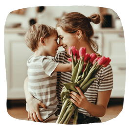 mother and son with flowers