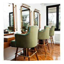 realistic salon with gorgeous green salon chairs